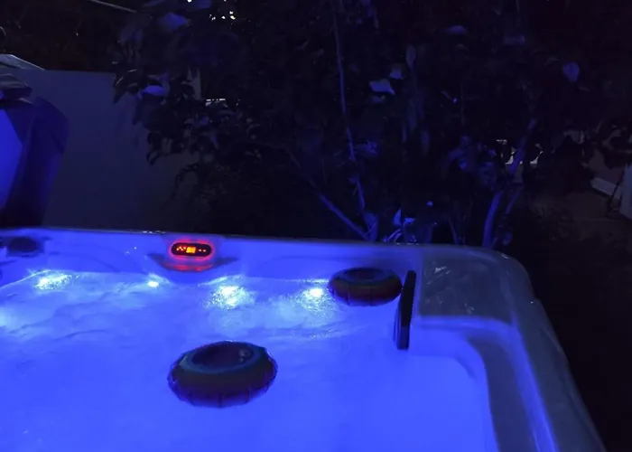 With Outdoor Jacuzzi